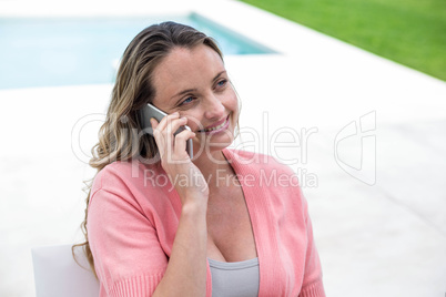 Pregnant woman making a phone call