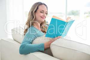 Pregnant woman reading a book