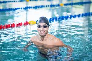 Handsome man swimming