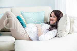 Pregnant woman reading a book