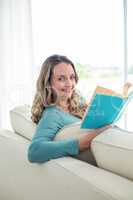 Pregnant woman reading a book