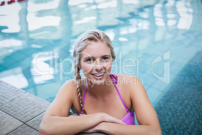 Fit woman resting on the edge