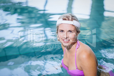 Fit woman doing underwater bike