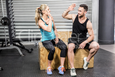 Fit couple doing high five