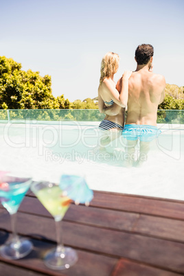 Happy couple in the pool