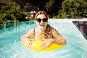 Smiling blonde with inflatable
