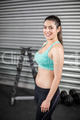 Portrait of smiling fit woman