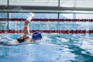 Fit woman swimming