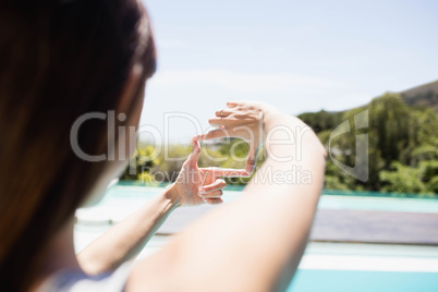 Woman making square with hands