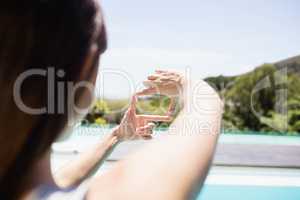 Woman making square with hands