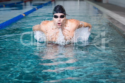 Fit man swimming