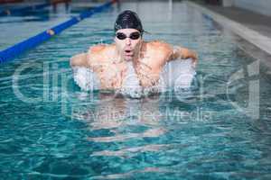 Fit man swimming