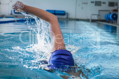 Fit woman swimming