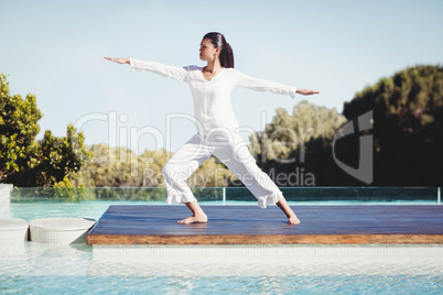 Calm brunette doing yoga