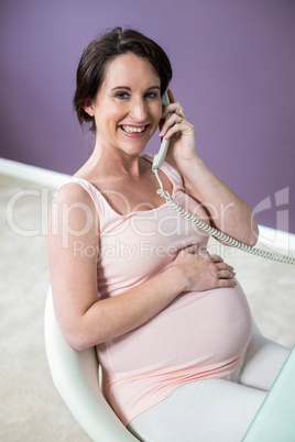 Pregnant woman on the phone