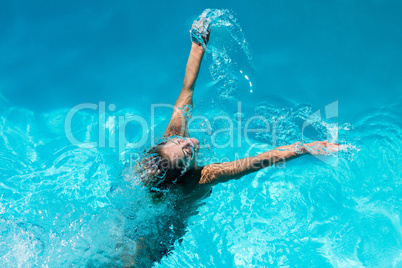 Woman heading out of pool