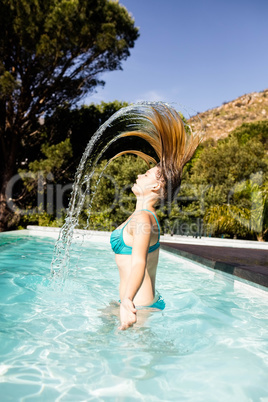 Beautiful blonde heading out of water