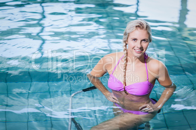 Fit woman doing underwater bike