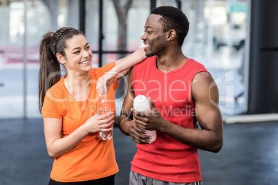 Smiling woman and man after effort
