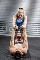 Athletic couple working out together