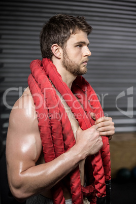 Man with rope around his neck