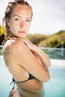 Unsmiling blonde in the pool