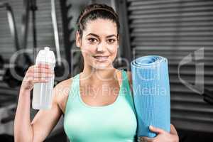 Athletic woman smiling to camera