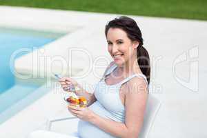 Portrait of smiling pregnant woman