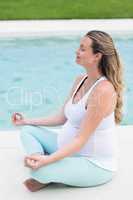 Pregnant woman doing yoga