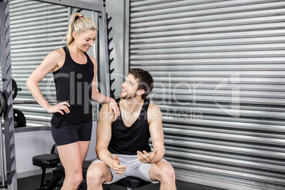 Fit couple talking together