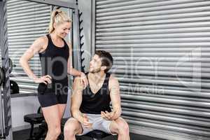 Fit couple talking together