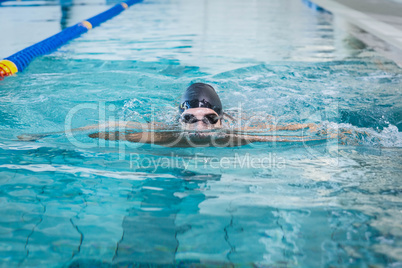 Handsome man swimming