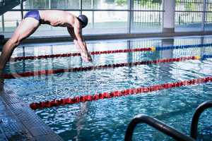 Fit man diving