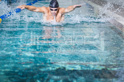 Fit man swimming