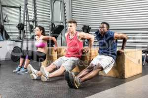 Fit people exercising together