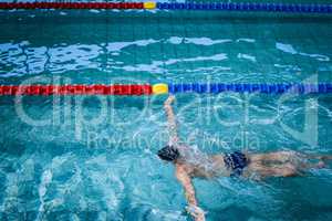 Fit man swimming