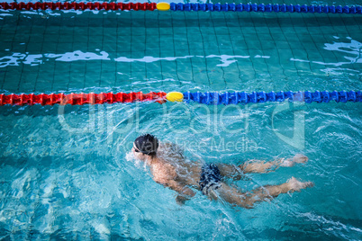 Fit man swimming