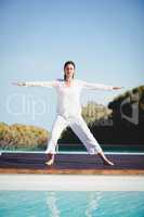 Calm brunette doing yoga