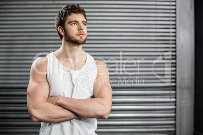 Serious fit man posing