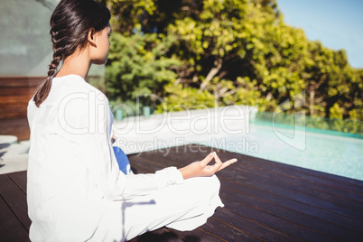 Calm brunette doing yoga