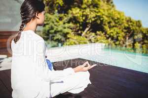 Calm brunette doing yoga