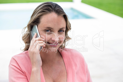 Pregnant woman making a phone call