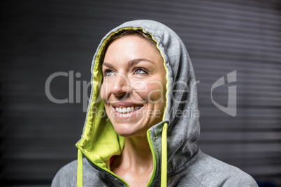 Portrait of woman wearing hood