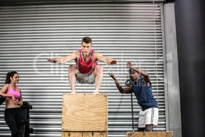 Fit people exercising together