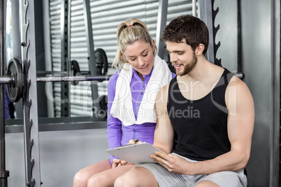 Trainer talking to his client