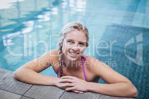 Fit woman resting on the edge