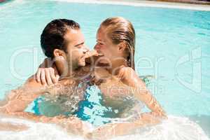 Happy couple in the pool