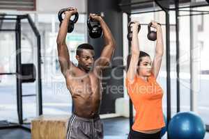 Athletic man and woman working out
