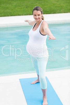 Pregnant woman doing yoga