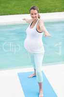 Pregnant woman doing yoga